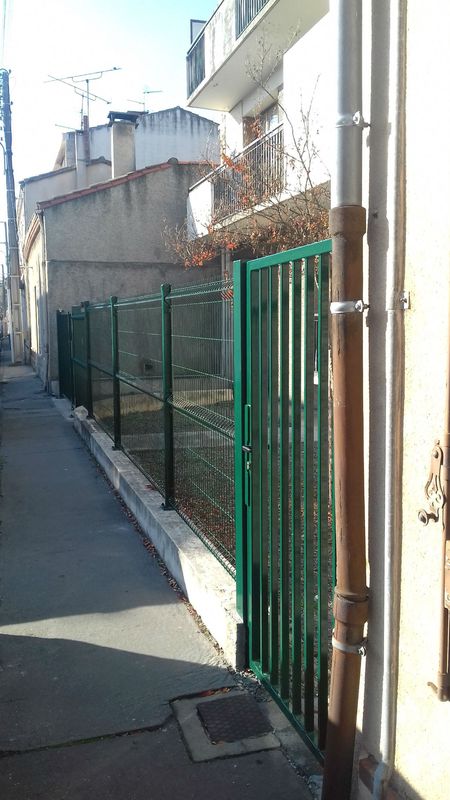 Installation d'une clôture de l'entrée d'un immeuble à Toulouse